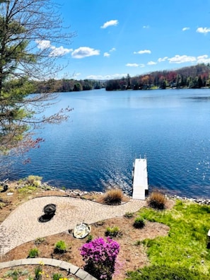 Enjoy a view of the sparkling lake right off the back deck