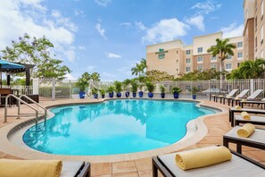Enjoy sunbathing by the pool