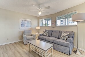 First Floor Living Space with a Flat Screen TV and Kitchen Area (Refrigerator, Stove, Sink, Queen Sleeper Sofa)