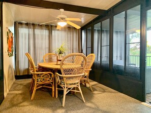 Entertain or just relax in the enclosed glass/screened lanai w/golf course view