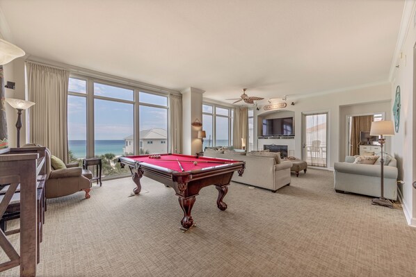 Gulf front living room with a pool table!