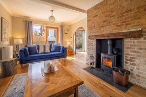 Monkey Puzzle Cottage, Snettisham: Comfortable seating and wood burning stove