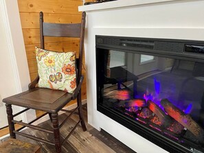 State-of-the-art fireplace. Turns on with just a touch of a button. 