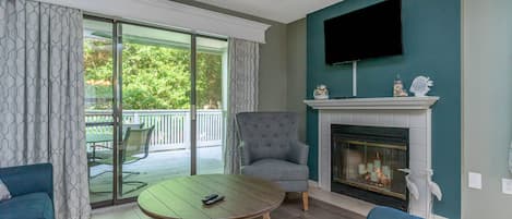 Living Room - Lovely and spacious living area with a sleeper sofa and access to the deck.