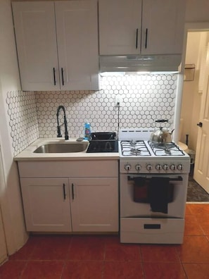 Brand new cabinets with gas stove and deep sink
