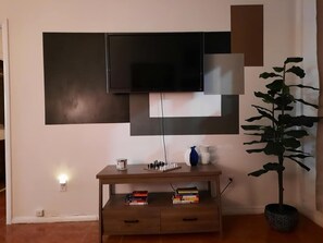 Flat screen TV with Firestick, books, games, puzzles...
