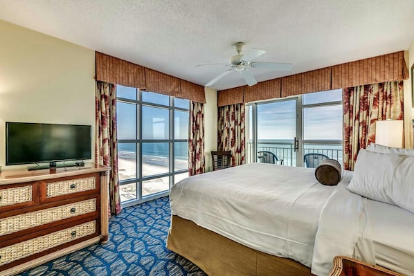 Ceiling to wall window view of beach