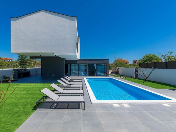 Sky, Property, Plant, Building, Rectangle, Azure, Shade, Swimming Pool, Architecture, Grass