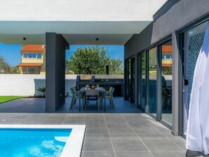 Water, Furniture, Plant, Table, Azure, Sky, Chair, Shade, Interior Design, Building