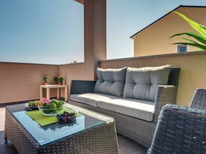 Couch, Furniture, Property, Rectangle, Outdoor Furniture, Interior Design, Plant, Architecture, Living Room, Studio Couch