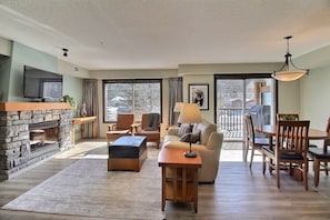 Welcoming open concept living and dining room spaces