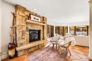 Stacked stone gas fireplace - perfect for warming up after a day outdoors