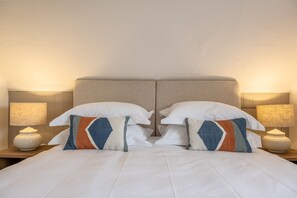 Tide Cottage, West Runton: Master bedroom with a super-king zip and link bed that can be converted to twin beds