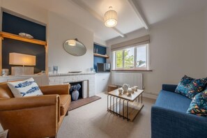 Tide Cottage, West Runton:  Stylish sitting room with Smart television