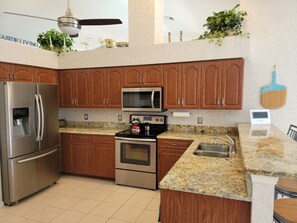 Modern Kitchen with Granite Counter tops.
