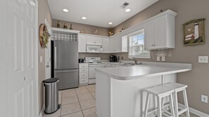 A chef's dream kitchen, fully stocked and loaded.