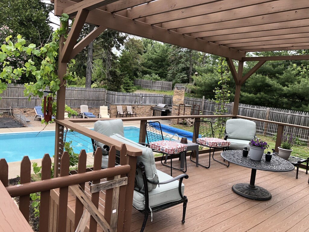 A backyard with a pool at a vacation rental near Portland Maine