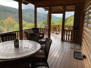 Enjoy a meal inside the screened porch while still taking in the views.