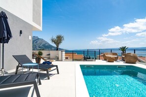 Private heated pool with hydromassage, amazing sea views from every room