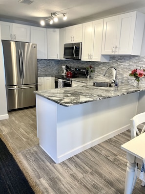 Kitchen w/ stainless steel appliances