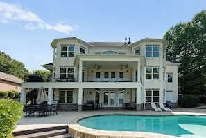 Enjoy the beautiful pool and hot tub while over looking the lake.
