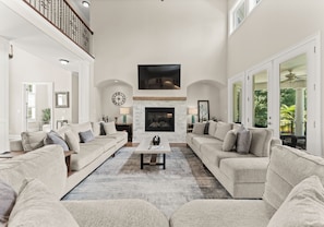 Living room with tons of seating and great lake views.