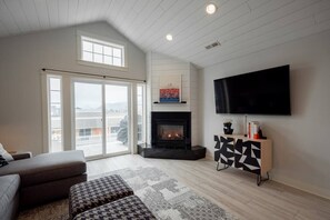 Light the fire on a cool night and stay in to watch a movie on the 65" HDTV with Amazon Prime Video, Apple TV, HBO Max, Netflix and Roku