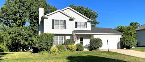 Outside, two-stall garage, ample parking in driveway and street