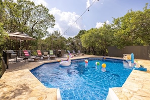 Heated pool, sky deck and plenty of pool toys for the kids (big or small).   Very private and fun!