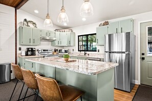 Updated Fully Stocked Kitchen With Granite Countertops!