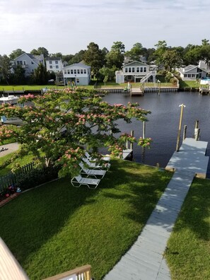 Back yard and 2 docks on deep water canal