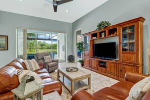 Sliding glass doors in the living area allow you to enjoy a lovely view; the mastersuite is just off the living room.