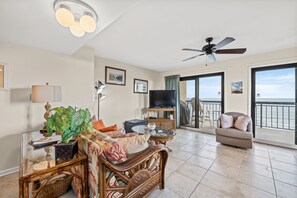 The ocean front living room is well-appointed with comfortable furnishings.