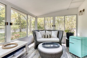 Enclosed, screened in sunroom. Great for early morning coffee and evenings