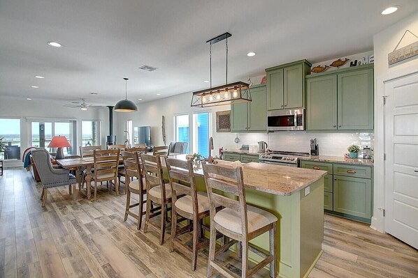 Spacious dining room table and counter top seating