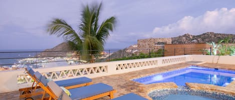 Poolside and jacuzzi with incredible ocean views