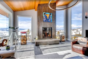 Living room with wood burning fireplace