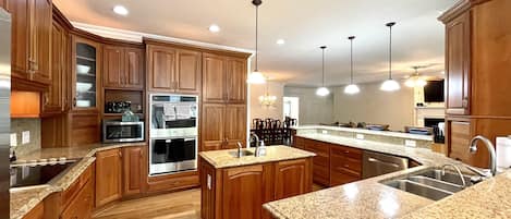 Large stocked kitchen with plenty of space. 