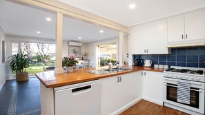 Fully equipped kitchen including dishwasher, microwave and coffee machines