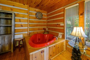 Enjoy a romantic soak in the heart-shaped jacuzzi tub