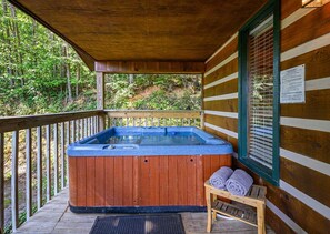 Enjoy a relaxing soak in the hot tub after a long day of exploring The Smokies