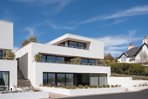 6 The Bay, Coldingham - front aspect of the three-storey detached villa, in which 6 The Bay offers an ultra-luxe first floor apartment