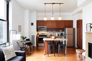 Fully stocked kitchen with granite island