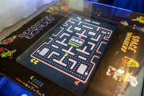 Classic arcade table has over 400 games for free play. Test your Pacman skills.