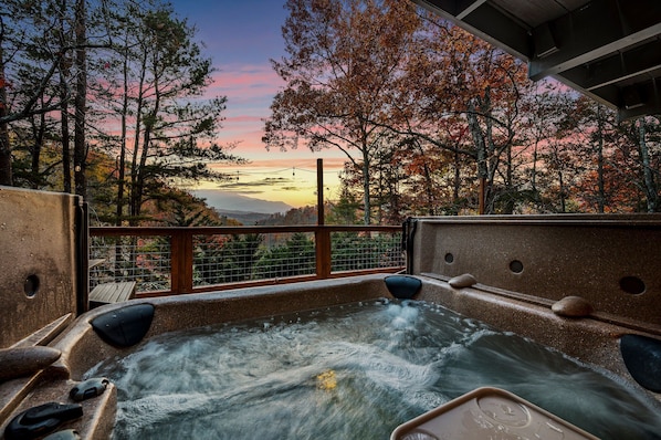Easy on/off cover & deck side access makes the hot tub w/ a mountain view great!