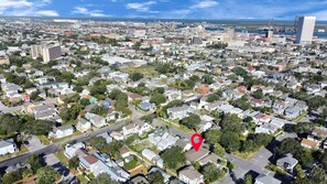 From above, a charming sea of rooftops and green lawns #aerialview