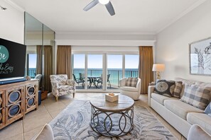 Living room with direct access to your private balcony. Large Screen TV with cable and wifi.