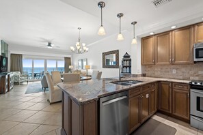 Open concept for the living area to incluse the dining room and kitchen. You can always be apart of the family activities. And what a view!
