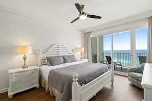 Comfortable kind size bed with crisp clean linen and light turquoise coverlet.  Great views to see the sunrise in the mornings.