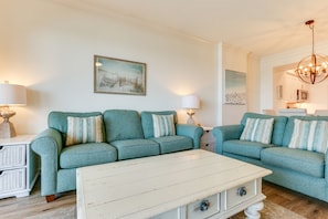 Living Room | Breathe Easy Rentals - Living room has a comfy sofa bed to accommodate all your guest.